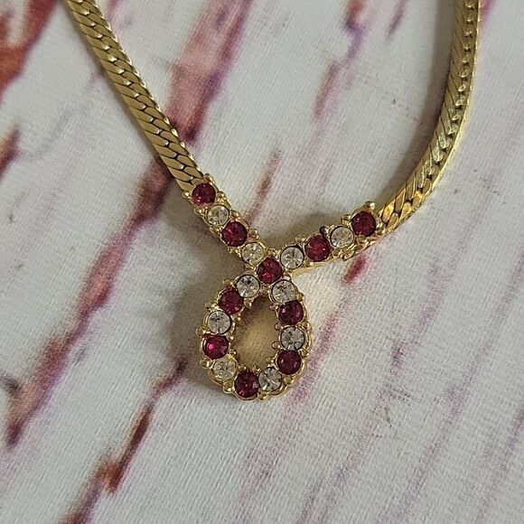 Goldtone Herringbone Chain with Red and White Ribbon Charm - Picture 1 of 6